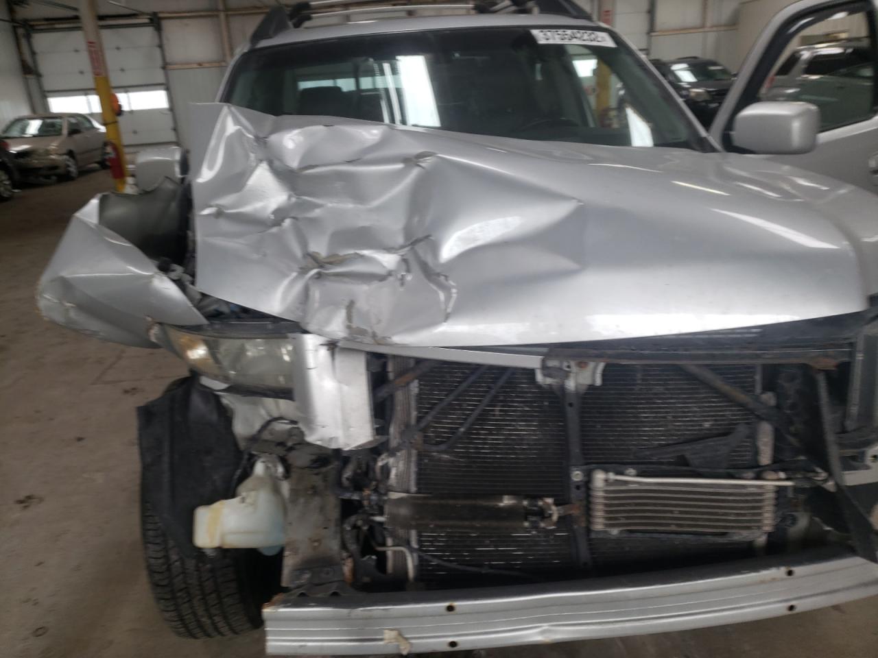 Photo 7 from auction – 2006 HONDA RIDGELINE with VIN 2HJYK16596H571556