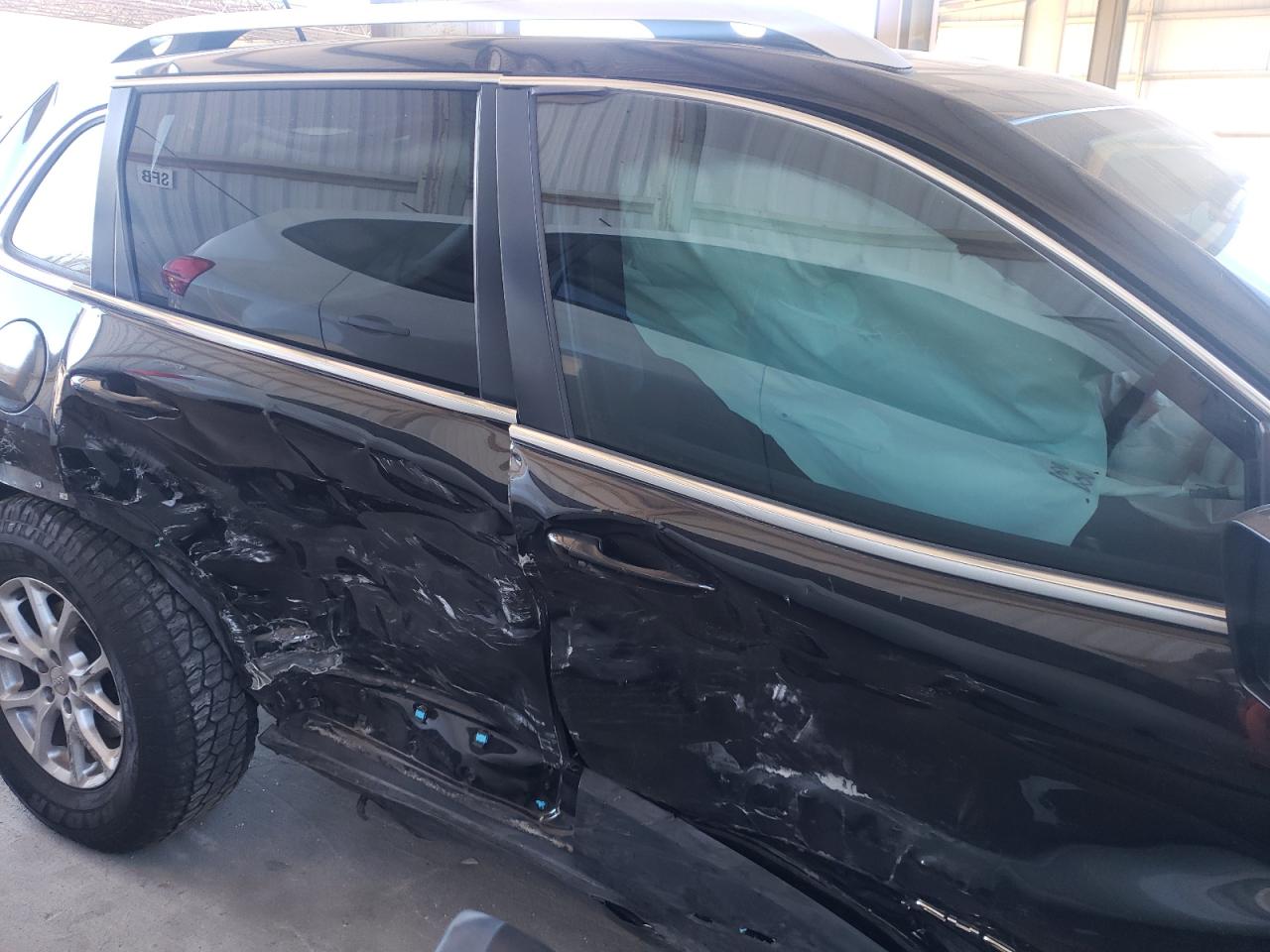 Photo 9 from auction – 2014 JEEP CHEROKEE L with VIN 1C4PJMCS7EW152569