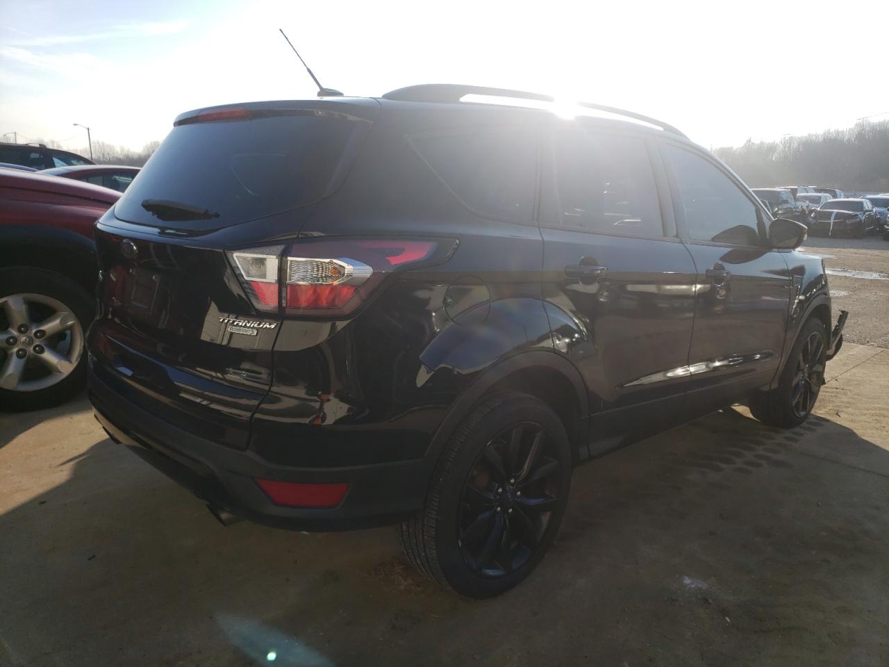 Photo 4 from auction – 2017 FORD ESCAPE TIT with VIN 1FMCU0JD9HUD15737