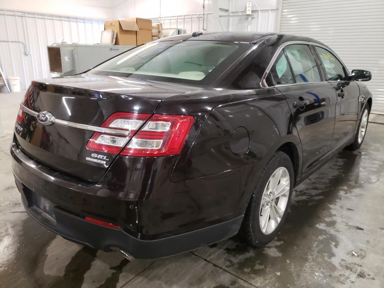 Photo 4 from auction – 2014 FORD TAURUS SEL with VIN 1FAHP2E89EG160195