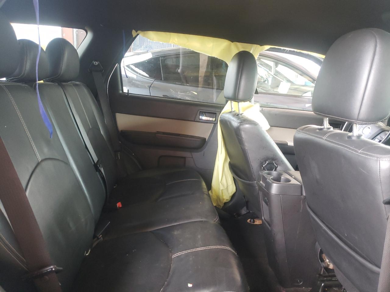 Photo 6 from auction – 2010 MERCURY MARINER PR with VIN 4M2CN9H76AKJ08675