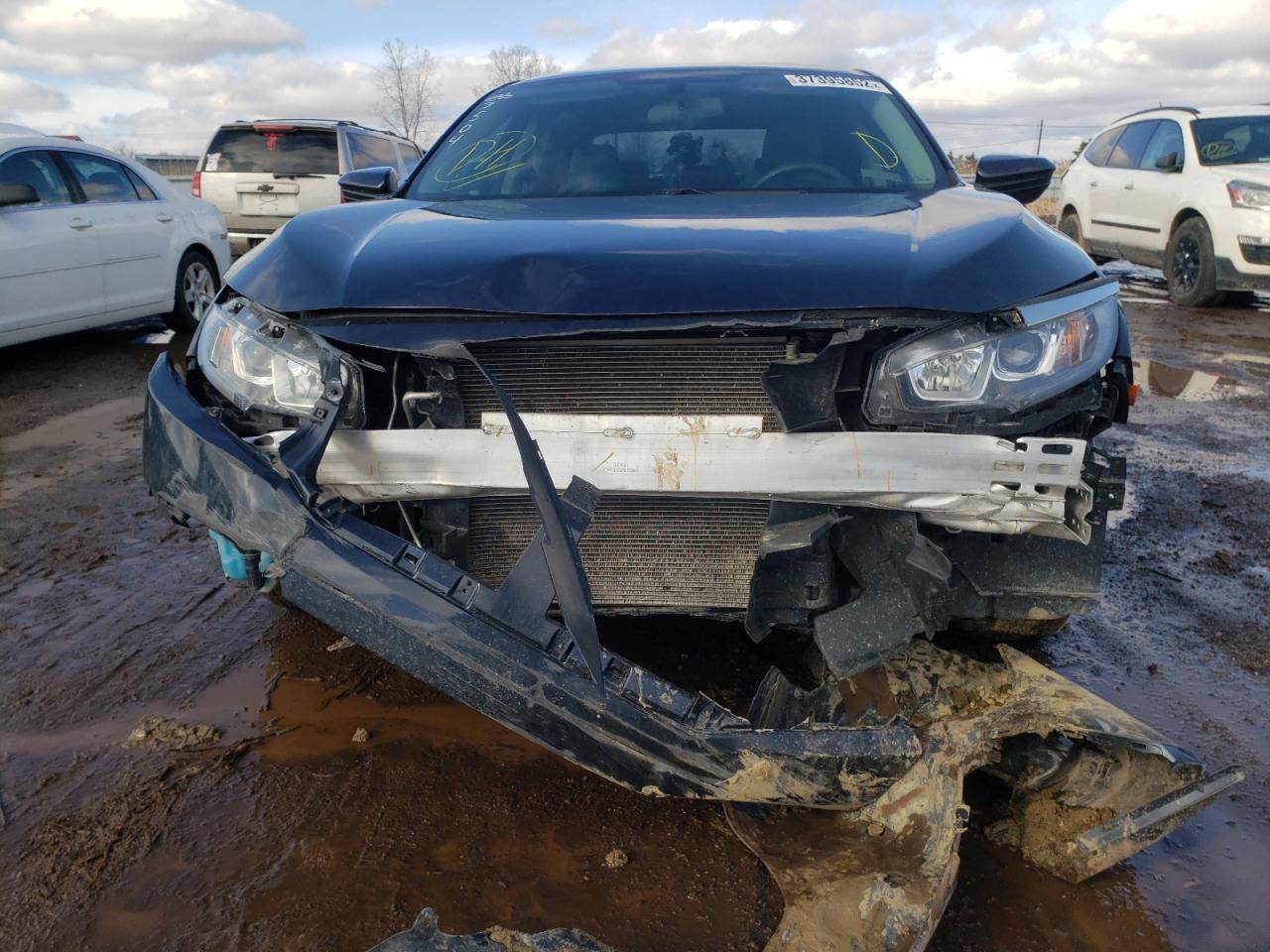 Photo 9 from auction – 2017 HONDA CIVIC LX with VIN 19XFC2F59HE053606
