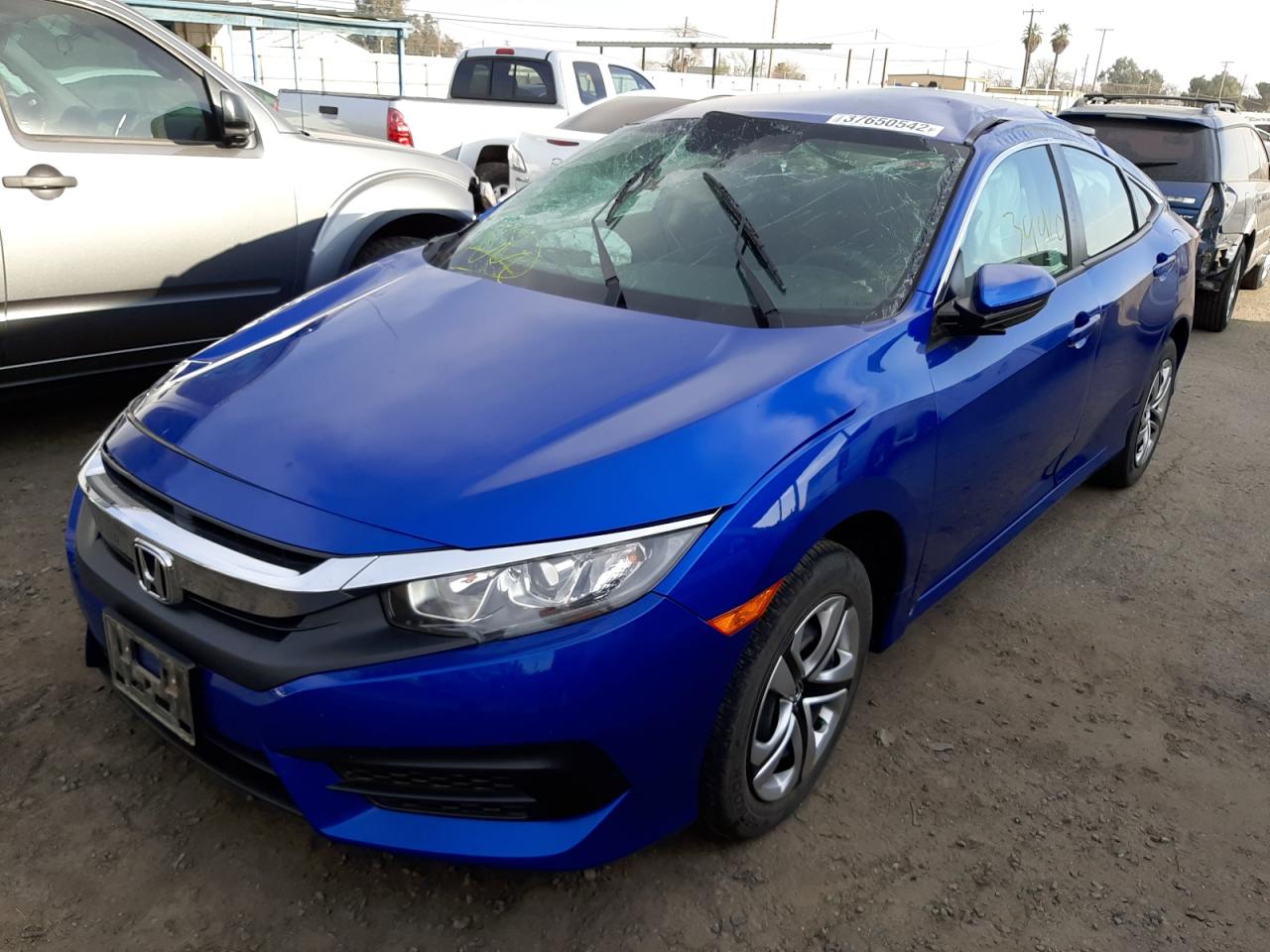 Photo 2 from auction – 2017 HONDA CIVIC LX with VIN 2HGFC2F58HH574001