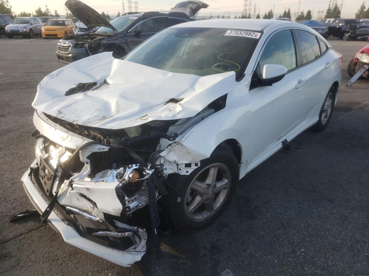 Photo 2 from auction – 2020 HONDA CIVIC LX with VIN 19XFC2F65LE202465
