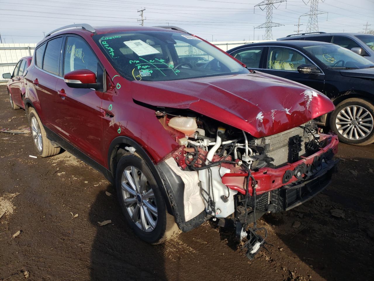 FORD ESCAPE TIT 2017 with VIN 1FMCU9J99HUC05898 - Photo from auction