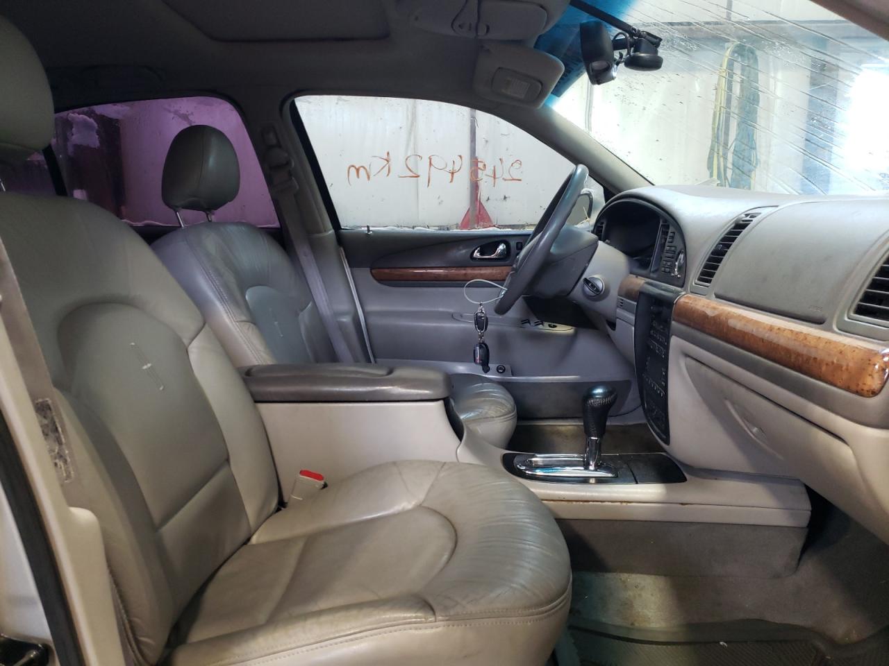 Photo 5 from auction – 1999 LINCOLN CONTINENTA with VIN 1LNHM97V2XY656124