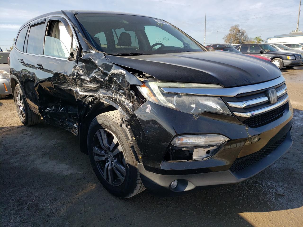 HONDA PILOT EXL 2016 with VIN 5FNYF5H67GB049800 - Photo from auction
