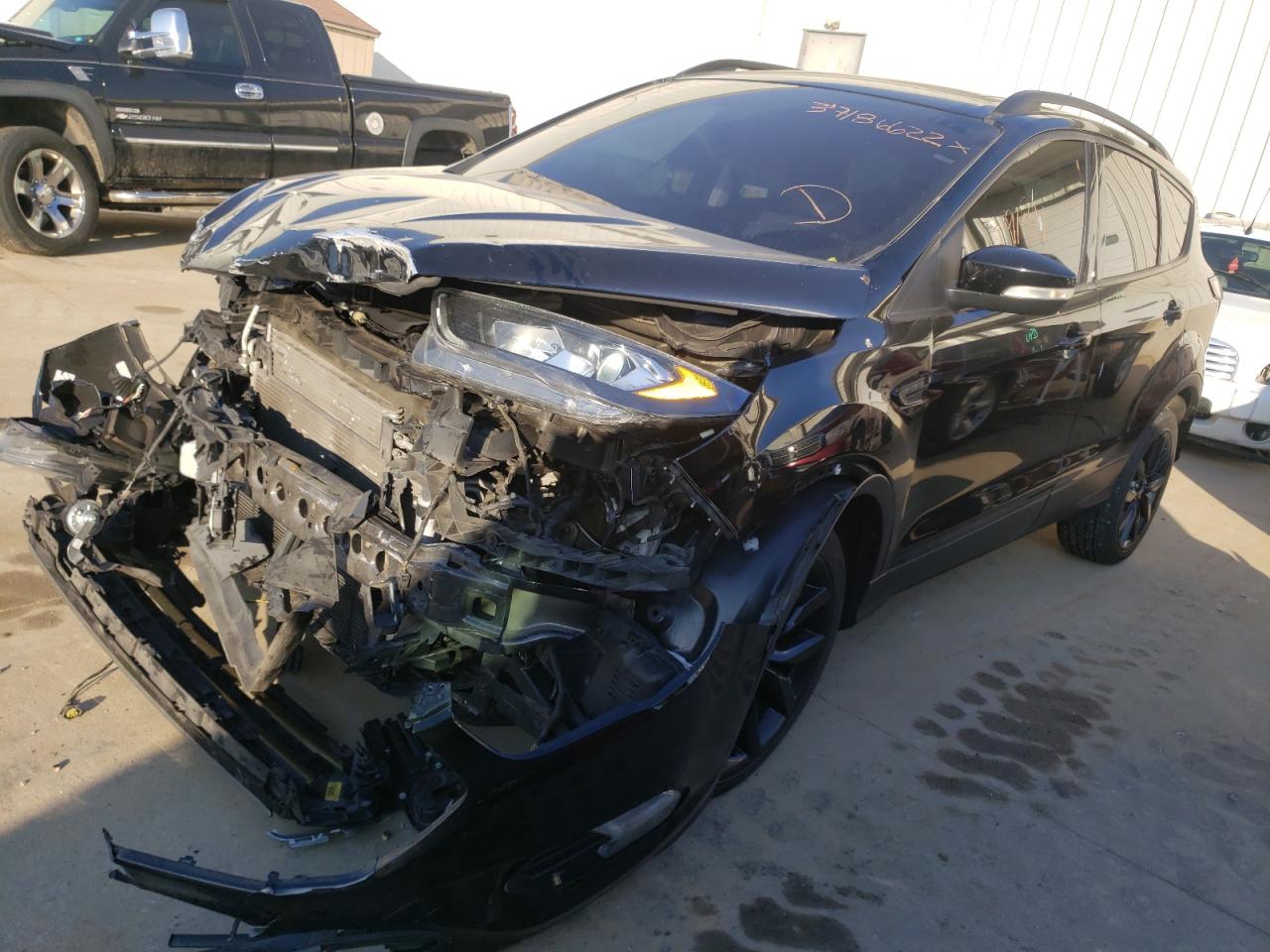 Photo 2 from auction – 2017 FORD ESCAPE TIT with VIN 1FMCU0JD9HUD15737
