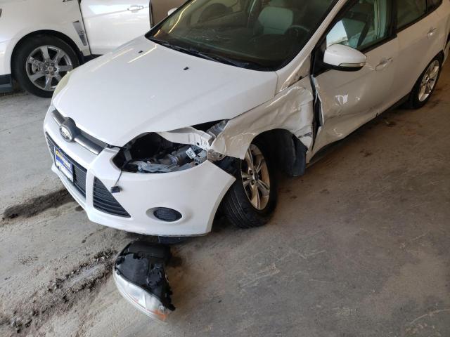 Photo 9 from auction – 2013 FORD FOCUS SE with VIN 1FADP3F28DL149273