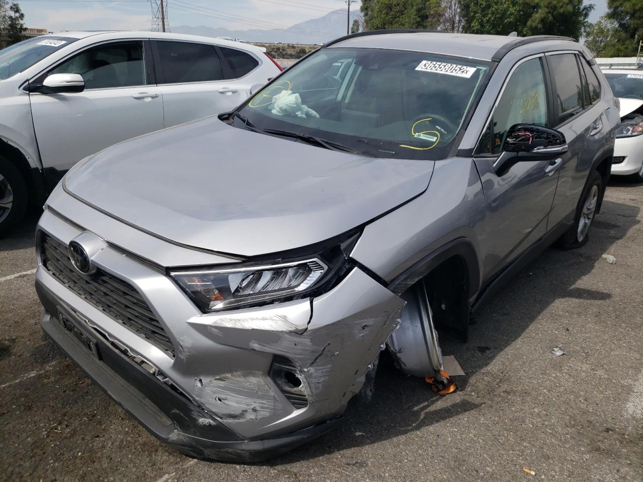 Photo 2 from auction – 2021 TOYOTA RAV4 XLE with VIN 2T3W1RFV0MC109852
