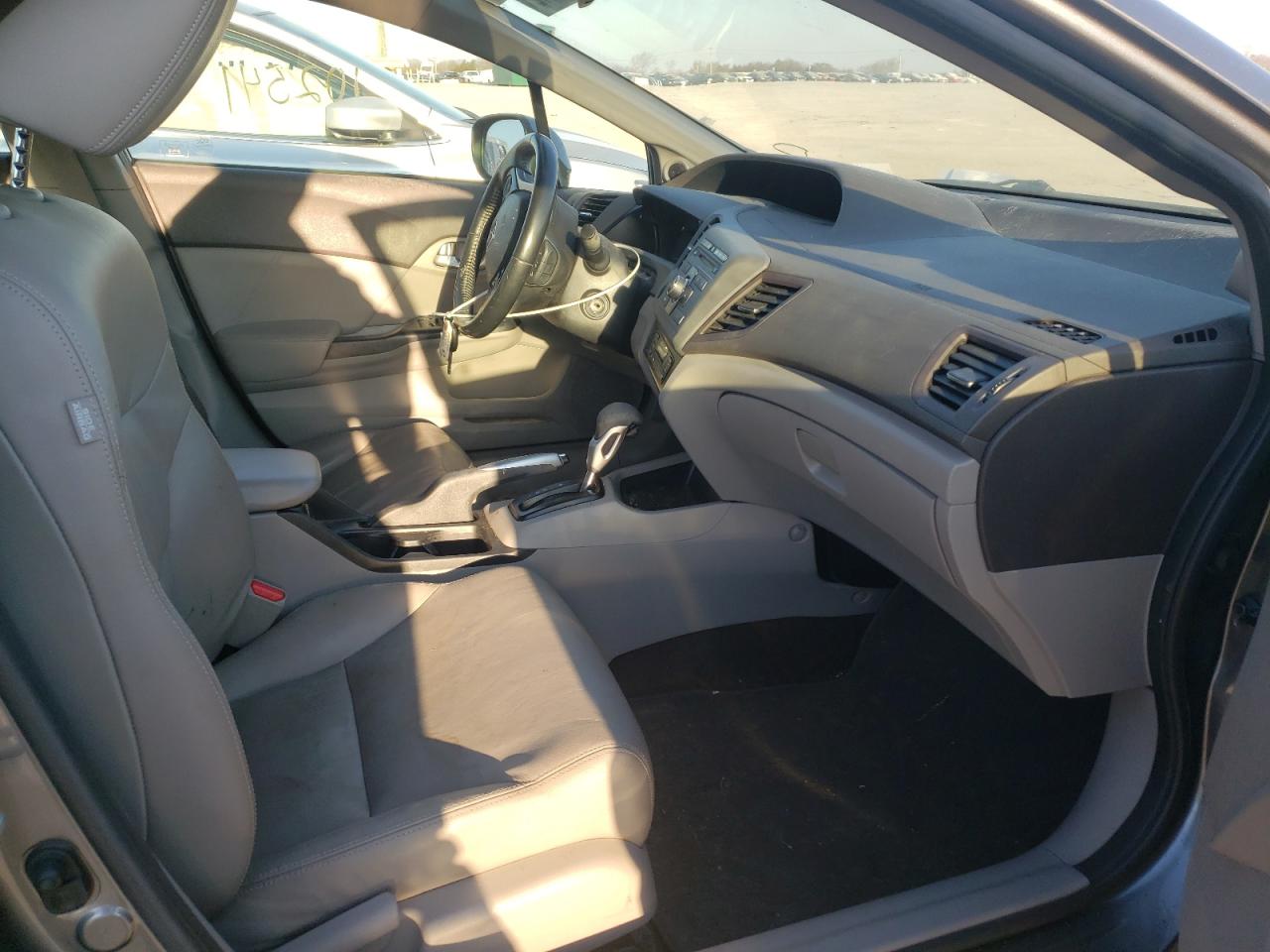Photo 5 from auction – 2012 HONDA CIVIC HYBR with VIN JHMFB4F33CS011031