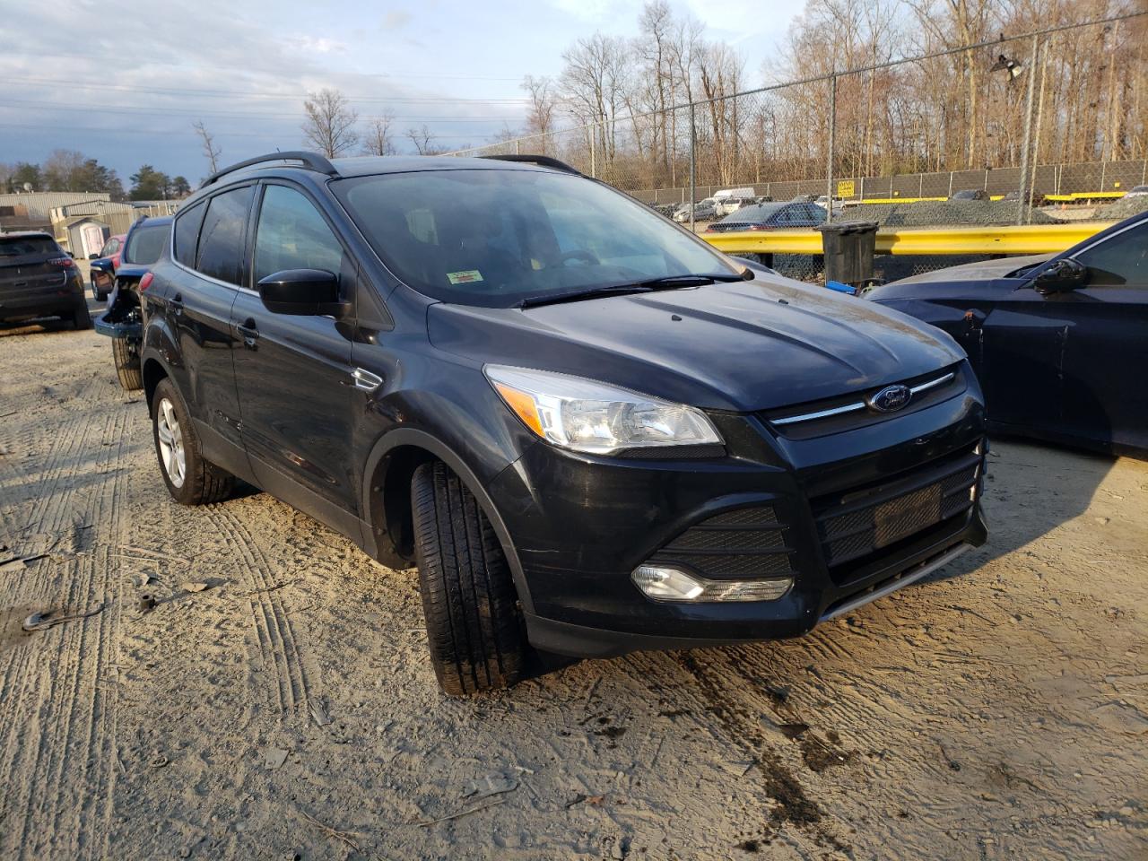 FORD ESCAPE SE 2014 with VIN 1FMCU9GX5EUB60721 - Photo from auction