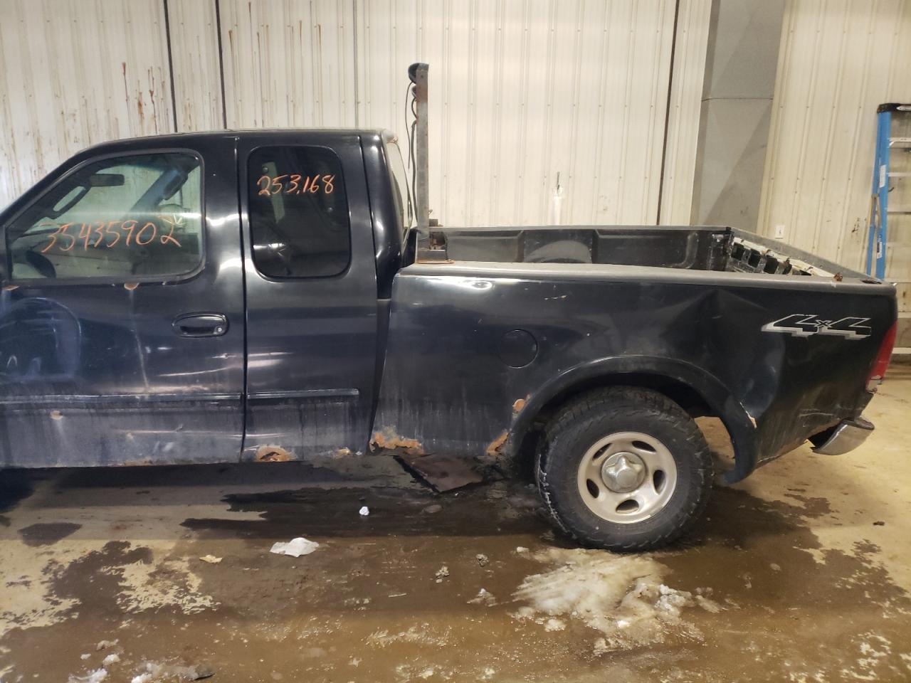 Photo 9 from auction – 2003 FORD F150 with VIN 1FTRX18WX3NA20393