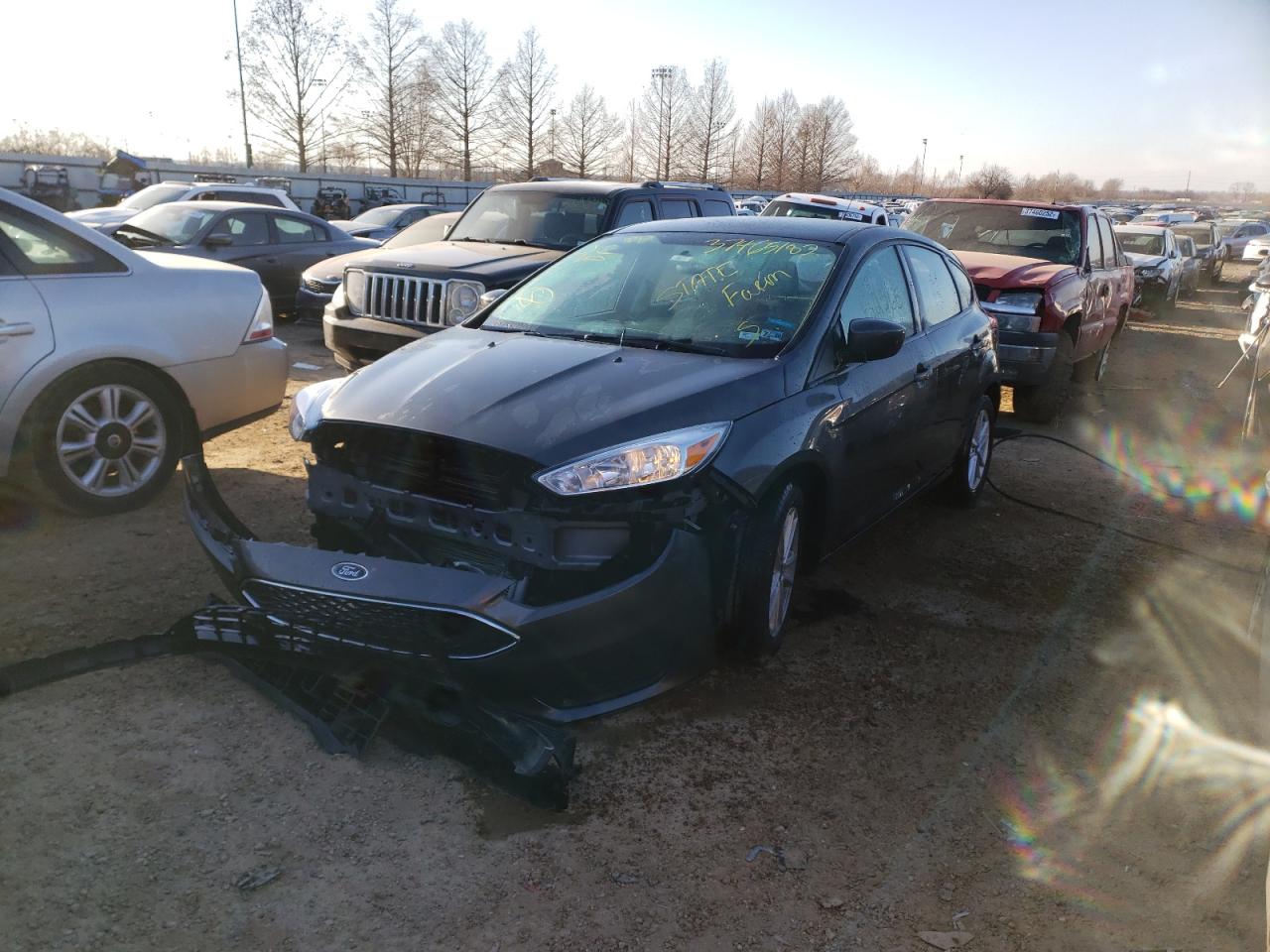 Photo 2 from auction – 2018 FORD FOCUS SE with VIN 1FADP3K25JL331756