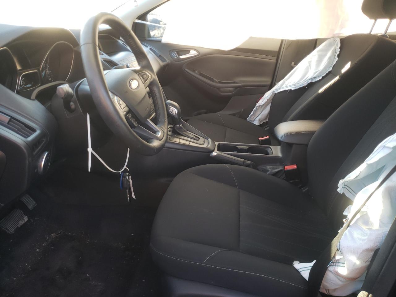 Photo 5 from auction – 2018 FORD FOCUS SE with VIN 1FADP3F23JL306848