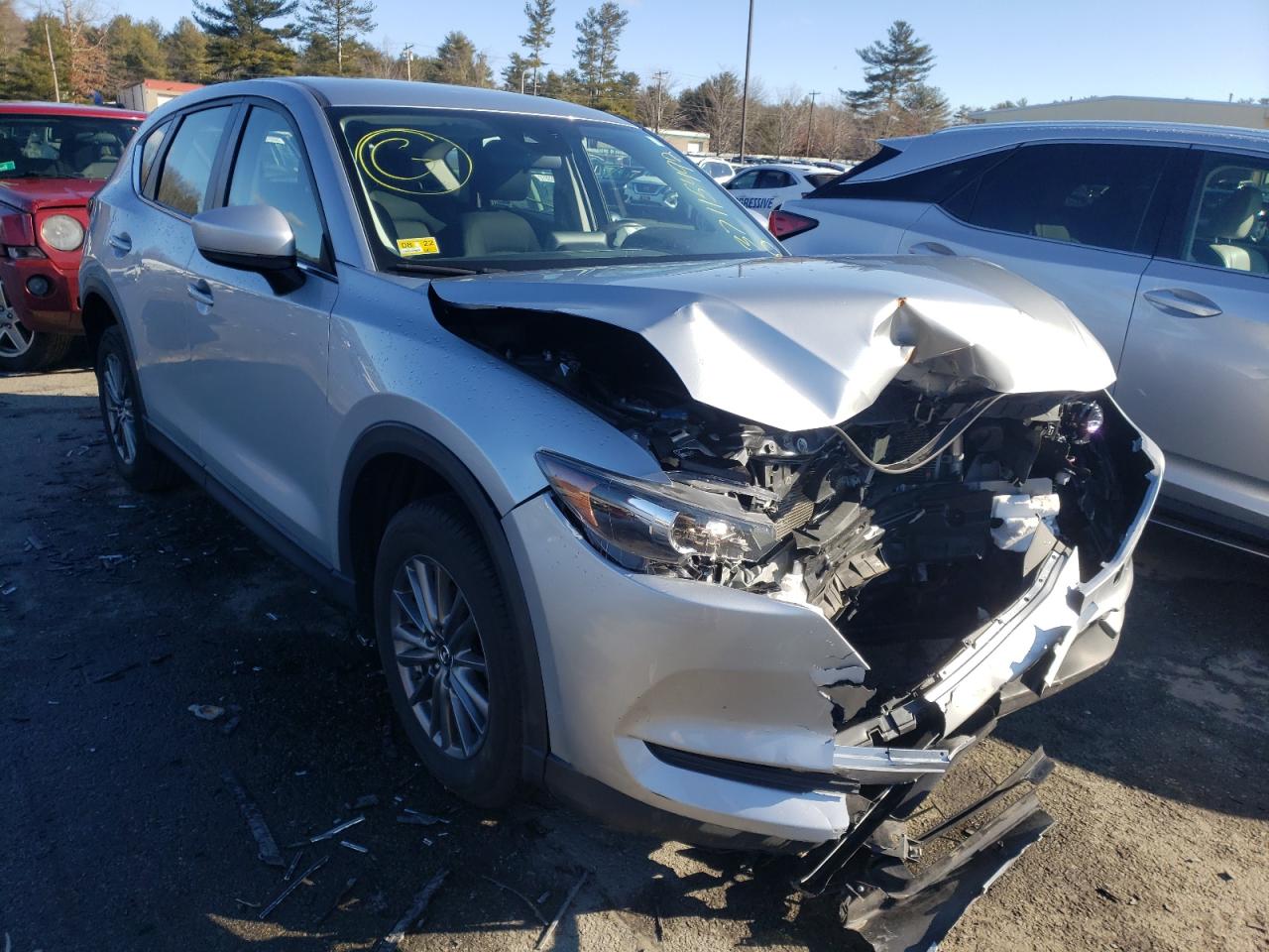 MAZDA CX-5 SPORT 2018 with VIN JM3KFBBM6J0472165 - Photo from auction