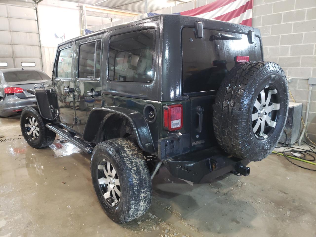 Photo 3 from auction – 2011 JEEP WRANGLER U with VIN 1J4BA3H14BL523537