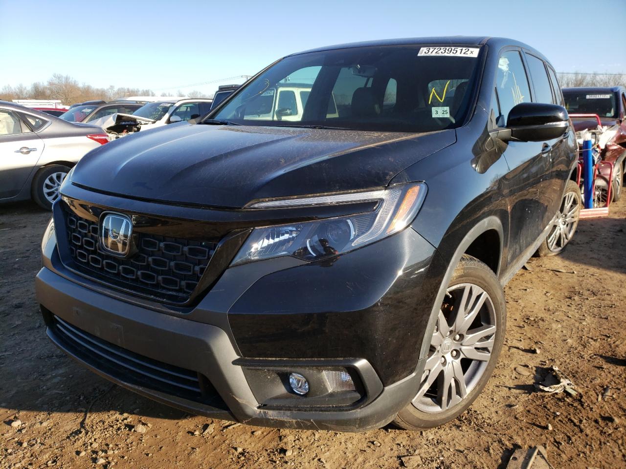 Photo 2 from auction – 2020 HONDA PASSPORT E with VIN 5FNYF8H56LB005662