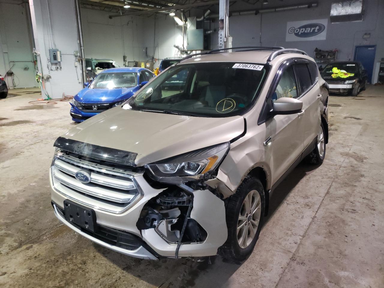 Photo 2 from auction – 2017 FORD ESCAPE SE with VIN 1FMCU9G96HUA97019