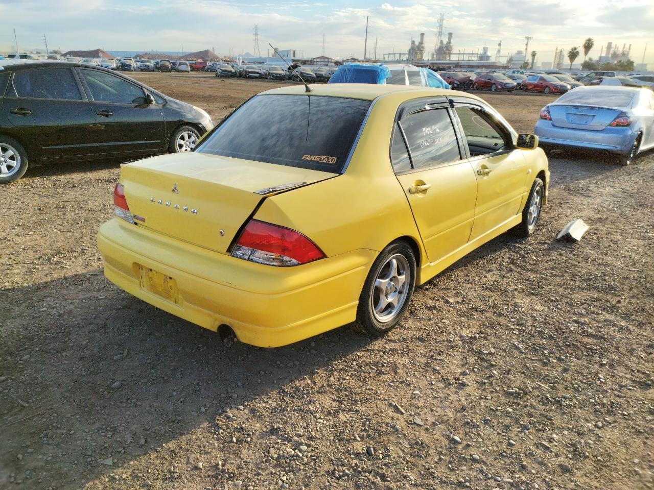 Photo 4 from auction – 2002 MITSUBISHI LANCER OZ with VIN JA3AJ86E32U080505