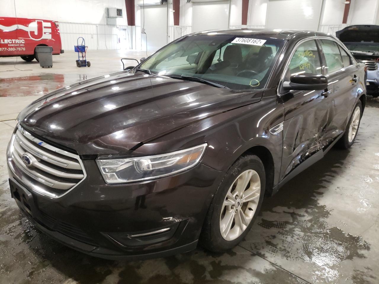 Photo 2 from auction – 2014 FORD TAURUS SEL with VIN 1FAHP2E89EG160195
