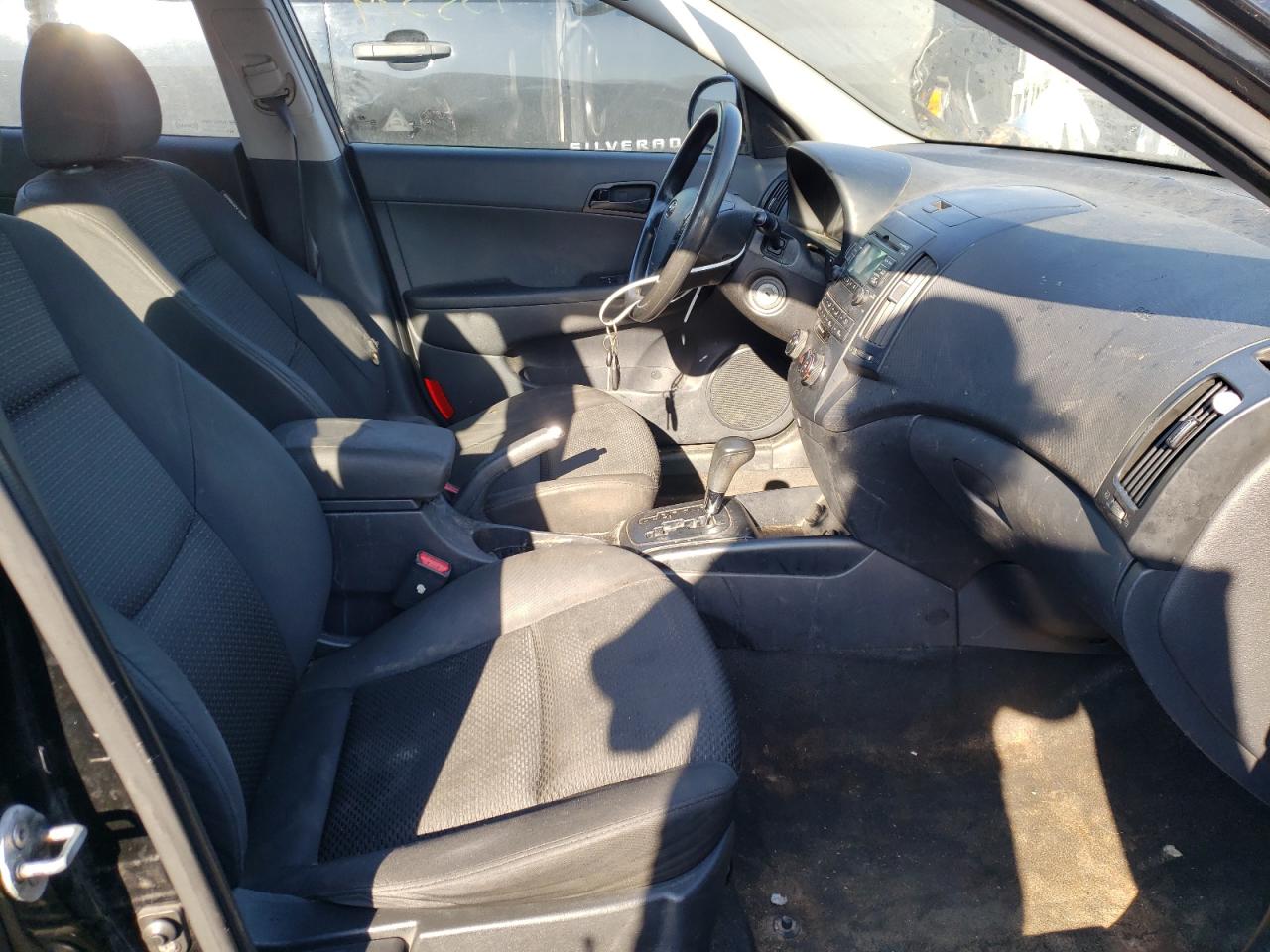Photo 5 from auction – 2011 HYUNDAI ELANTRA TO with VIN KMHDB8AEXBU110954