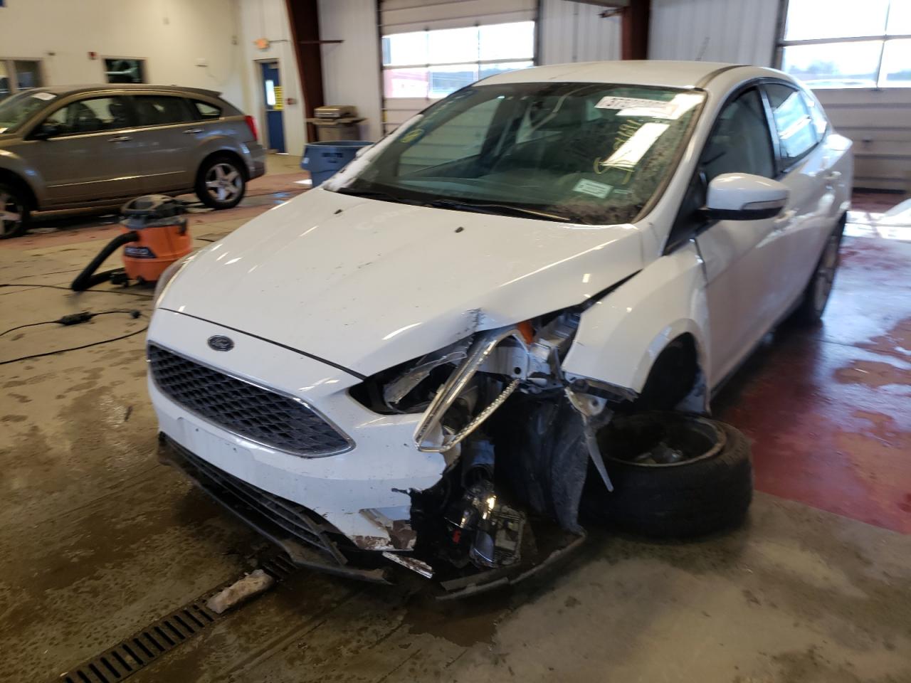 Photo 2 from auction – 2016 FORD FOCUS SE with VIN 1FADP3F20GL243636