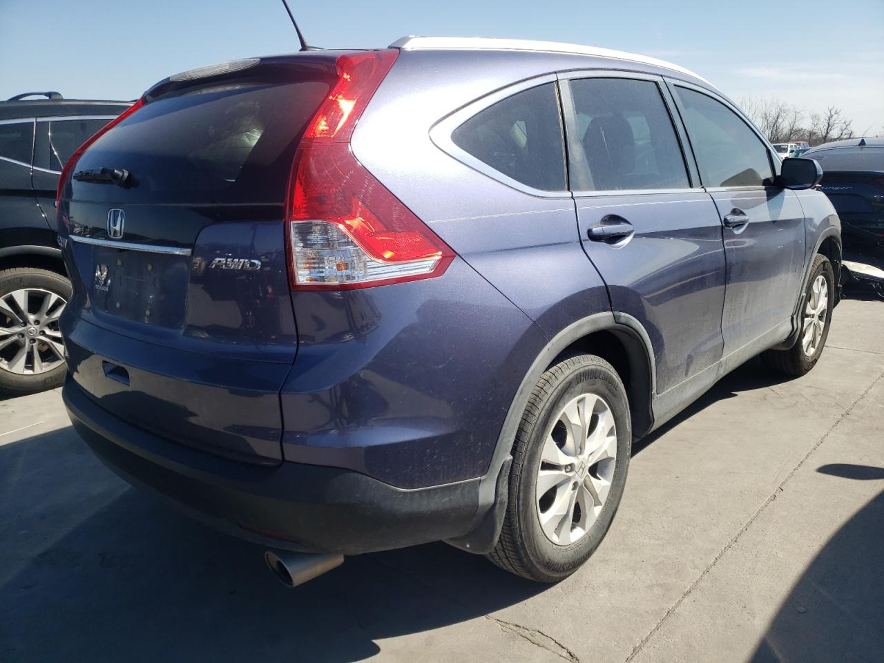 Photo 4 from auction – 2013 HONDA CR-V EXL with VIN 2HKRM4H79DH608208