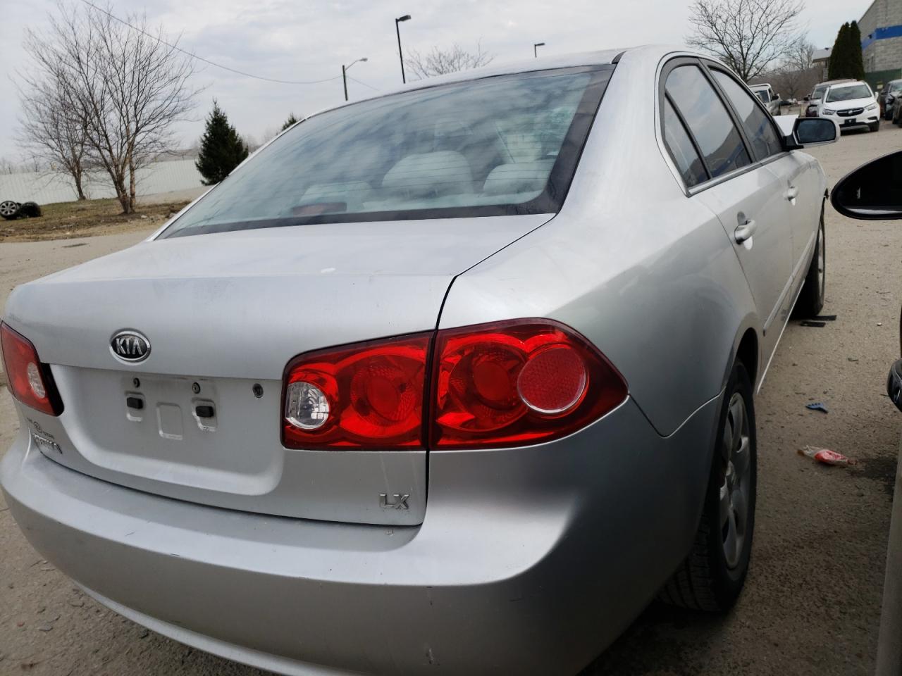 Photo 4 from auction – 2007 KIA OPTIMA LX with VIN KNAGE123275119286