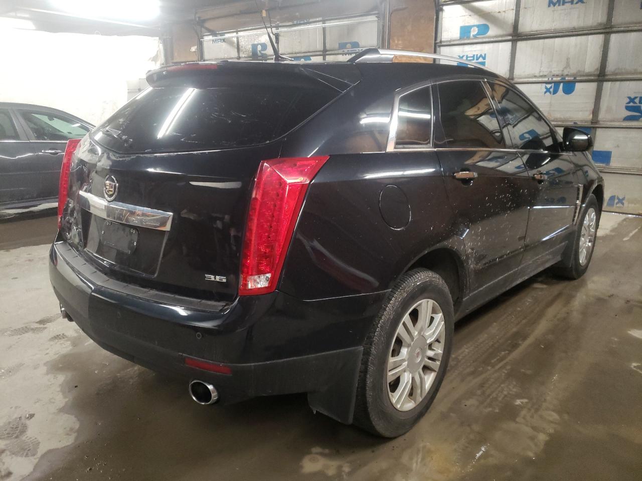 Photo 4 from auction – 2012 CADILLAC SRX LUXURY with VIN 3GYFNDE39CS655545