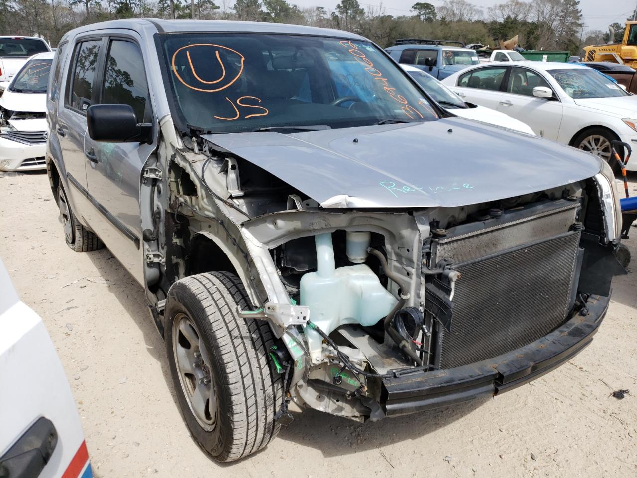 HONDA PILOT LX 2013 with VIN 5FNYF3H21DB044122 - Photo from auction