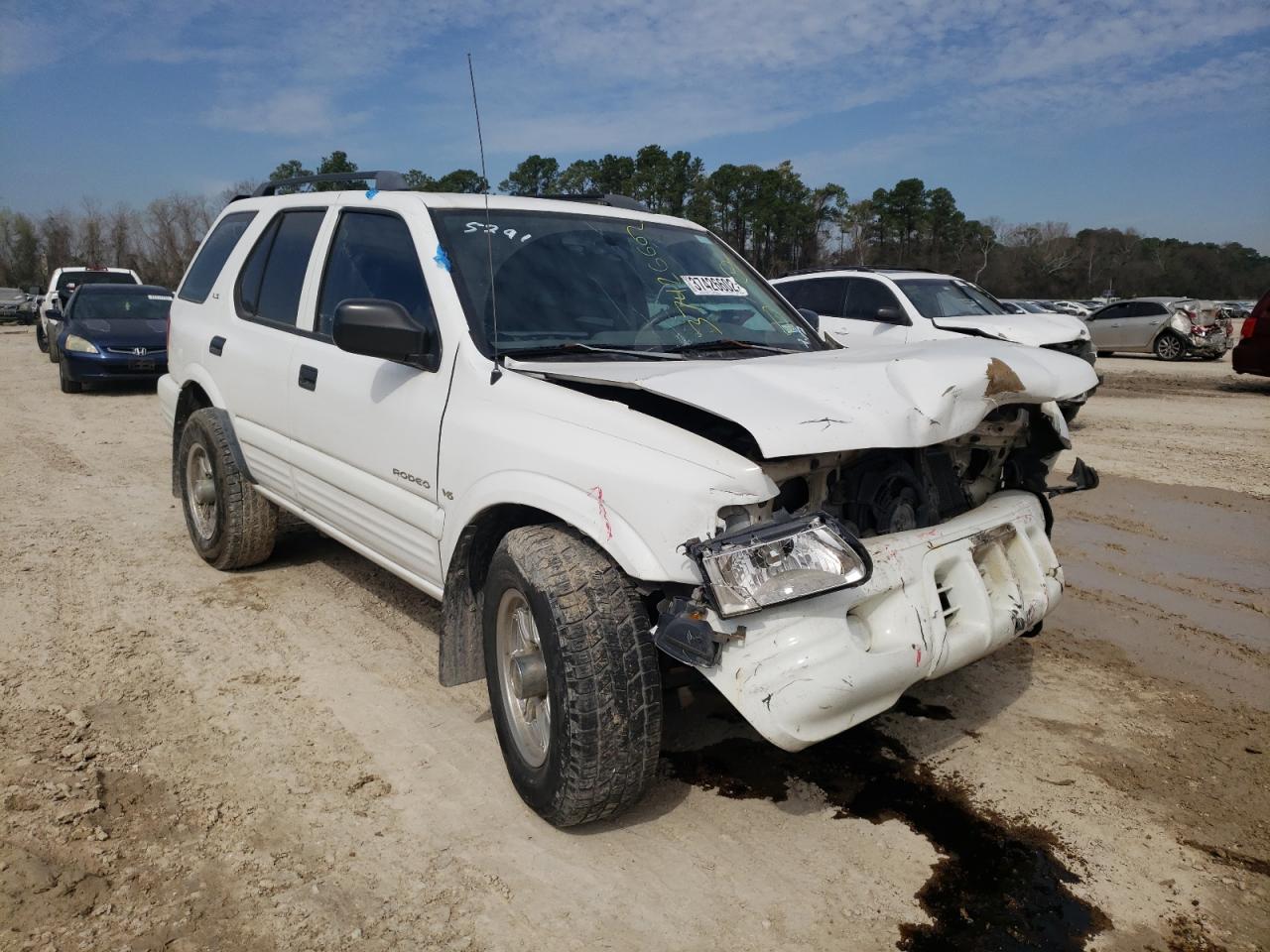 ISUZU RODEO S 2000 with VIN 4S2CK58W4Y4355291 - Photo from auction