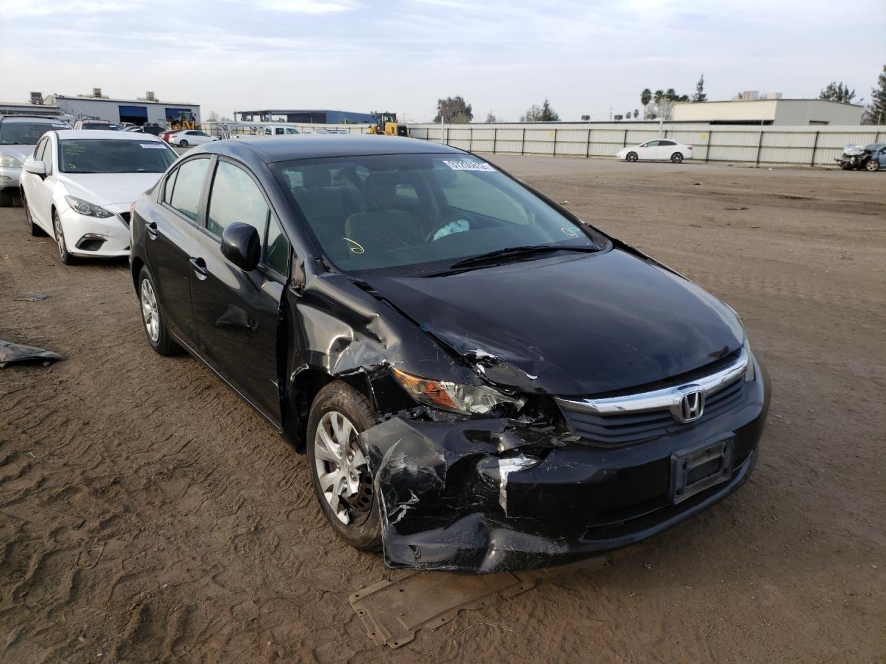 HONDA CIVIC LX 2012 with VIN 2HGFB2F54CH323858 - Photo from auction
