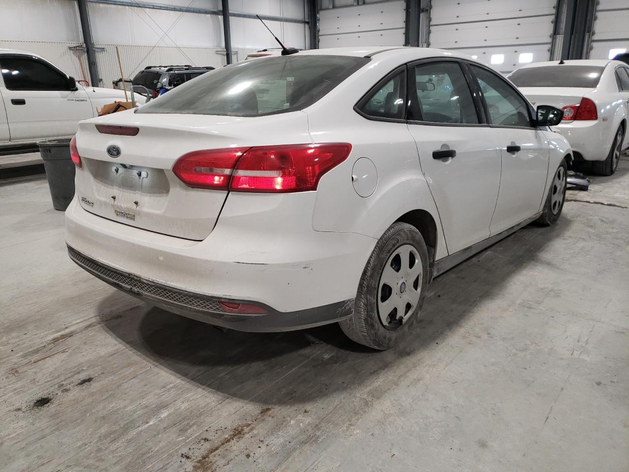 Photo 4 from auction – 2017 FORD FOCUS S with VIN 1FADP3E22HL324673