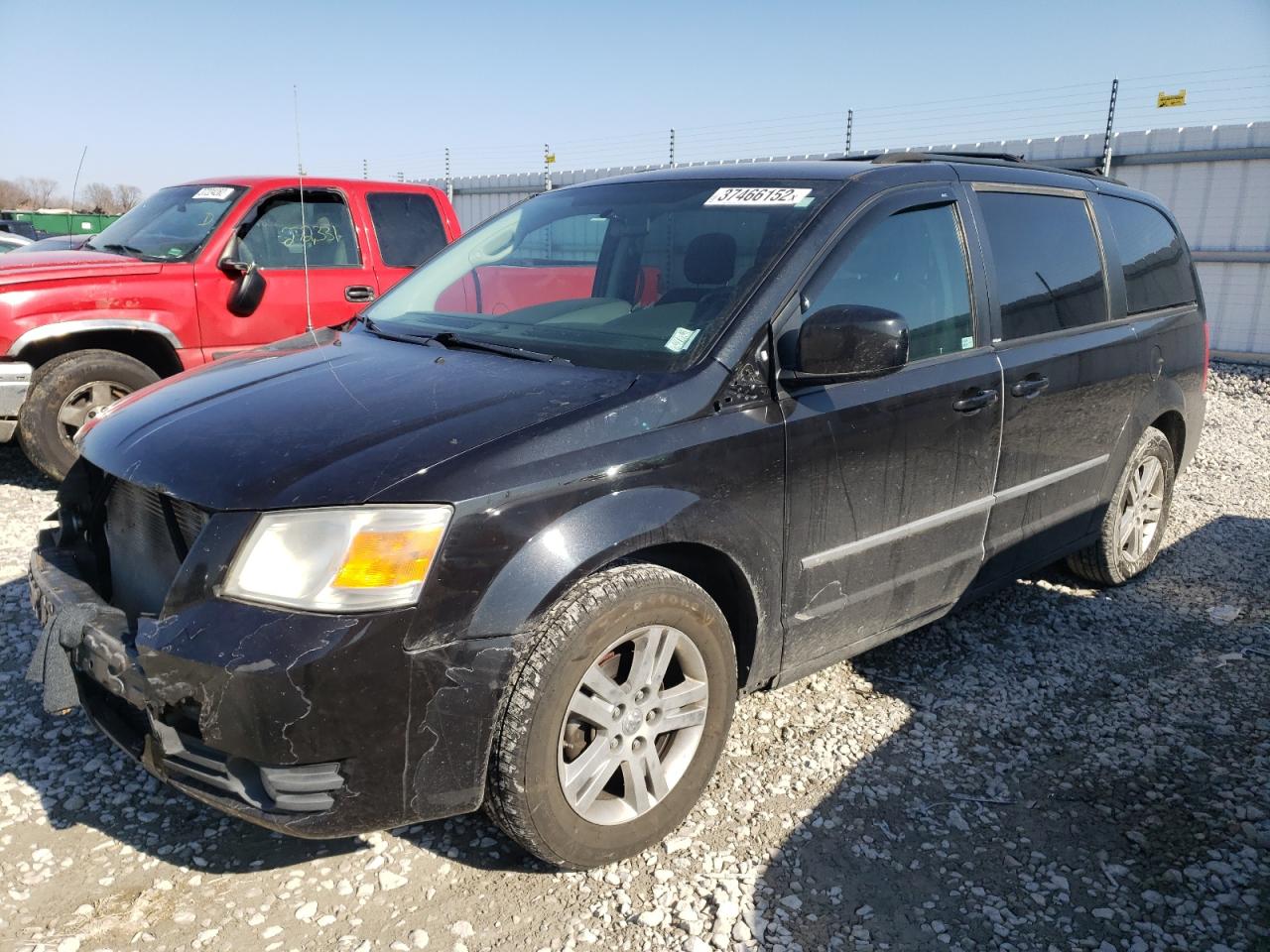 Photo 2 from auction – 2010 DODGE GRAND CARA with VIN 2D4RN6DX7AR490157
