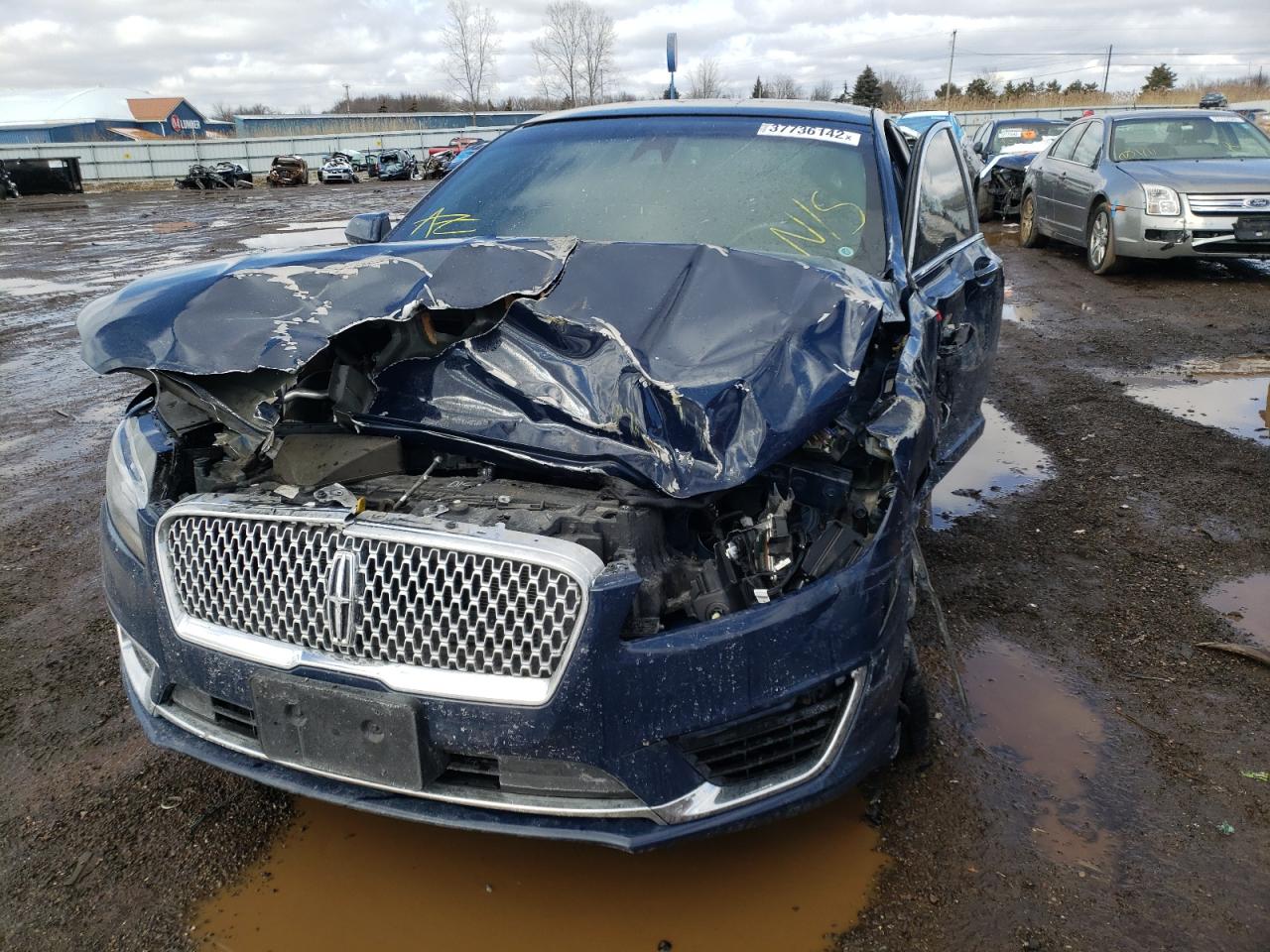 Photo 9 from auction – 2018 LINCOLN MKZ RESERV with VIN 3LN6L5FC5JR607752