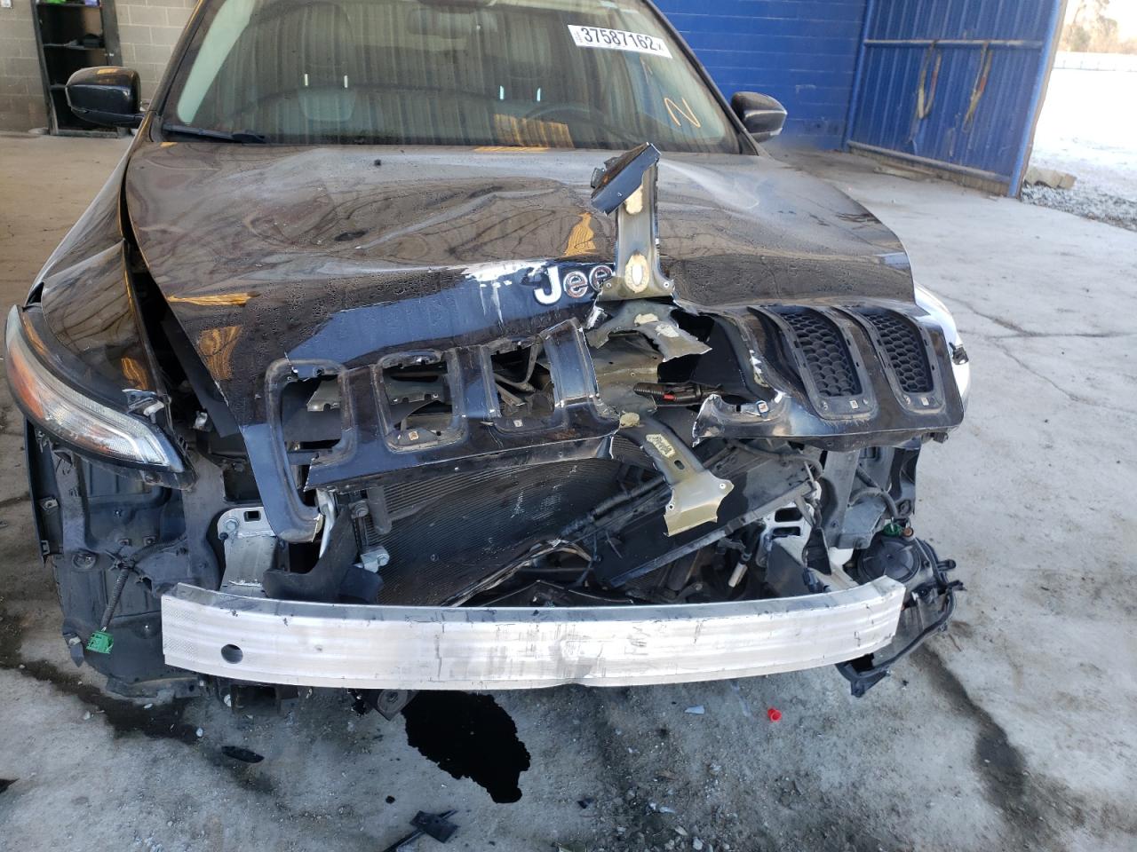 Photo 9 from auction – 2014 JEEP CHEROKEE L with VIN 1C4PJLDB9EW204552