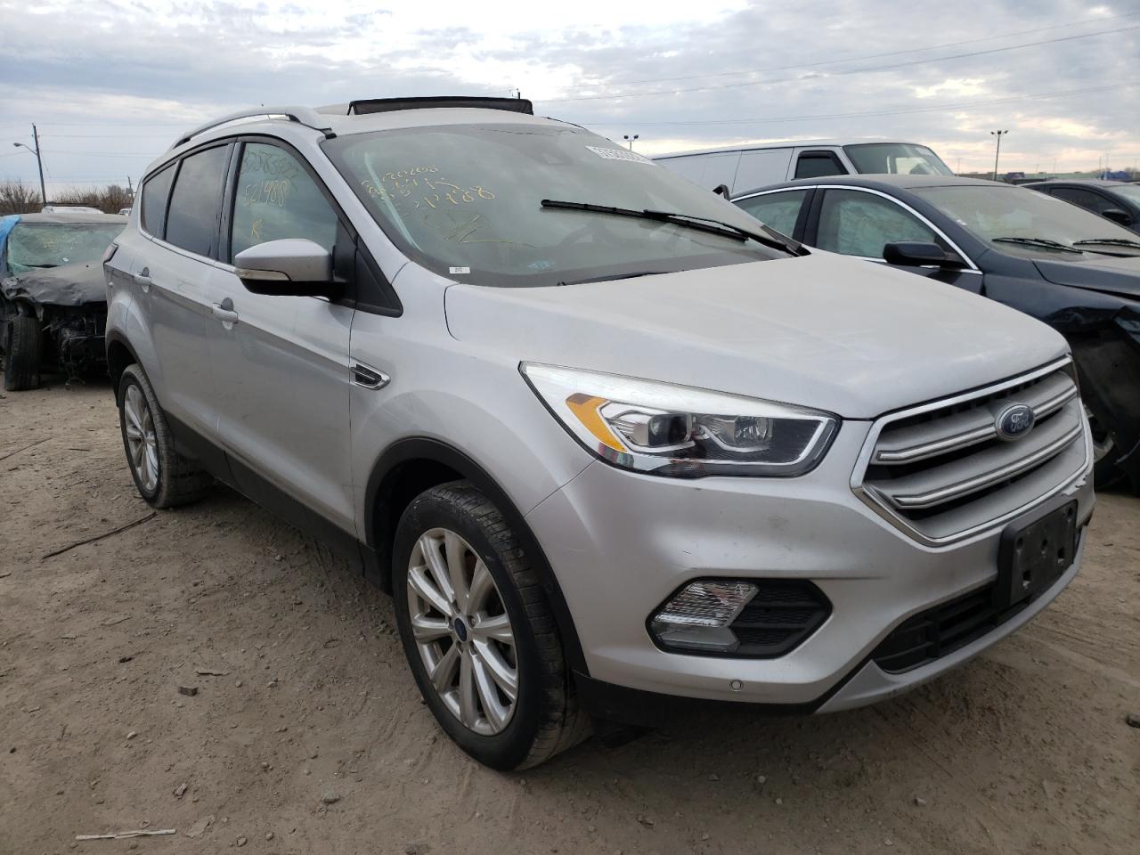 FORD ESCAPE TIT 2017 with VIN 1FMCU9J97HUE21488 - Photo from auction