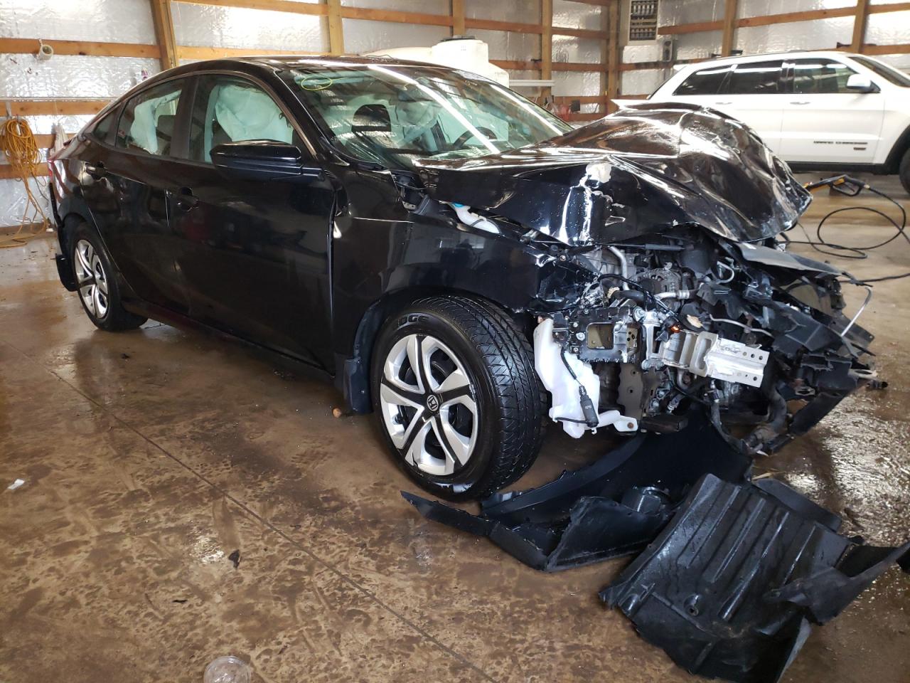 HONDA CIVIC LX 2016 with VIN 19XFC2F5XGE066752 - Photo from auction