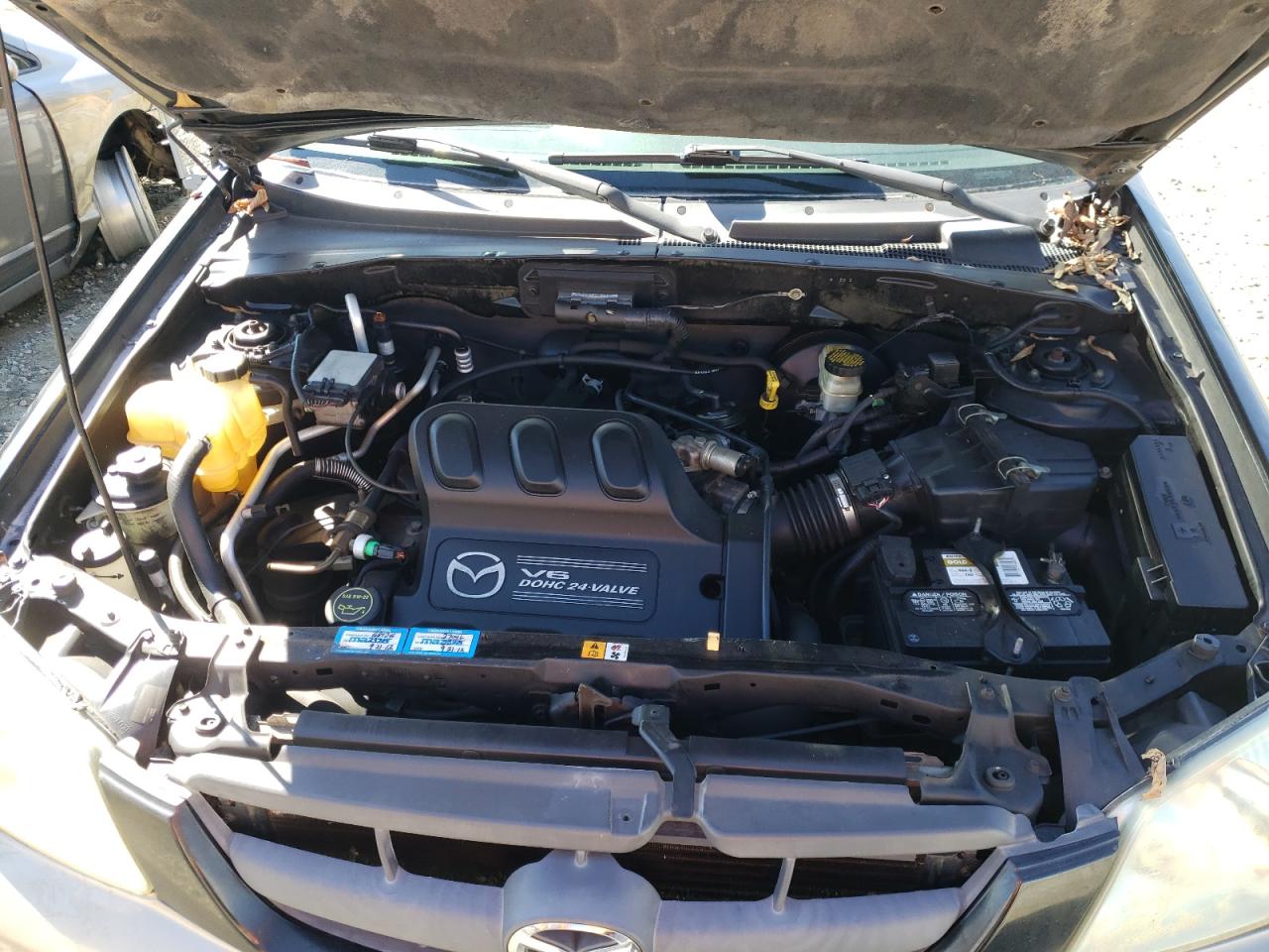 Photo 7 from auction – 2004 MAZDA TRIBUTE LX with VIN 4F2YZ04134KM21247