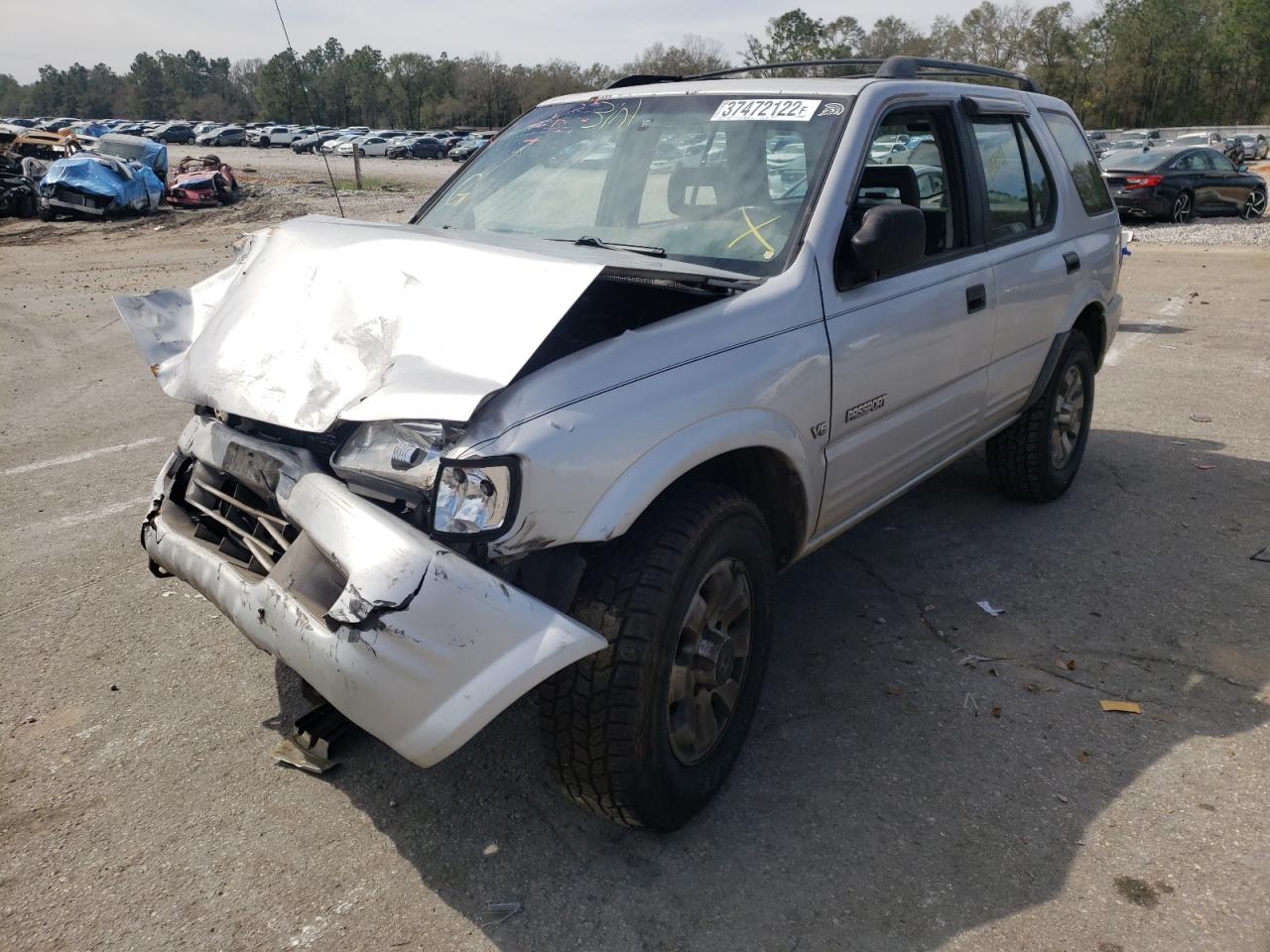 Photo 2 from auction – 1999 HONDA PASSPORT E with VIN 4S6CM58W7X4414888