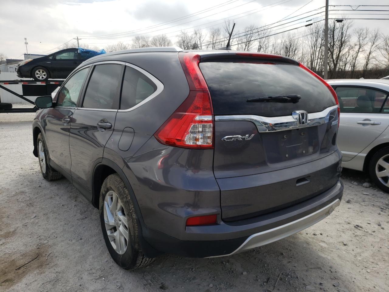Photo 3 from auction – 2016 HONDA CR-V EXL with VIN 5J6RM4H75GL010191