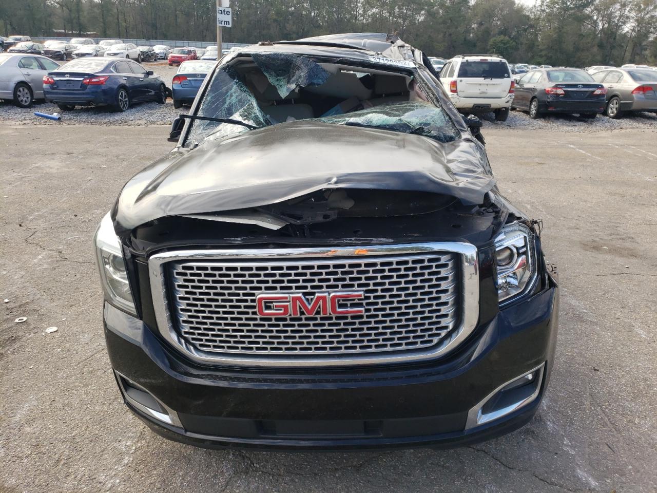 Photo 9 from auction – 2016 GMC YUKON with VIN 1GKS1CKJ7GR126282