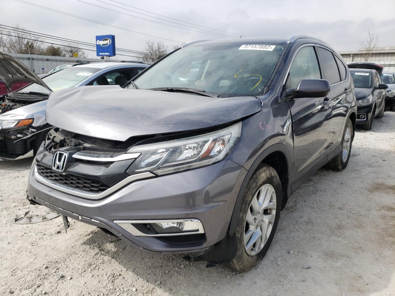 Photo 2 from auction – 2016 HONDA CR-V EXL with VIN 5J6RM4H75GL010191