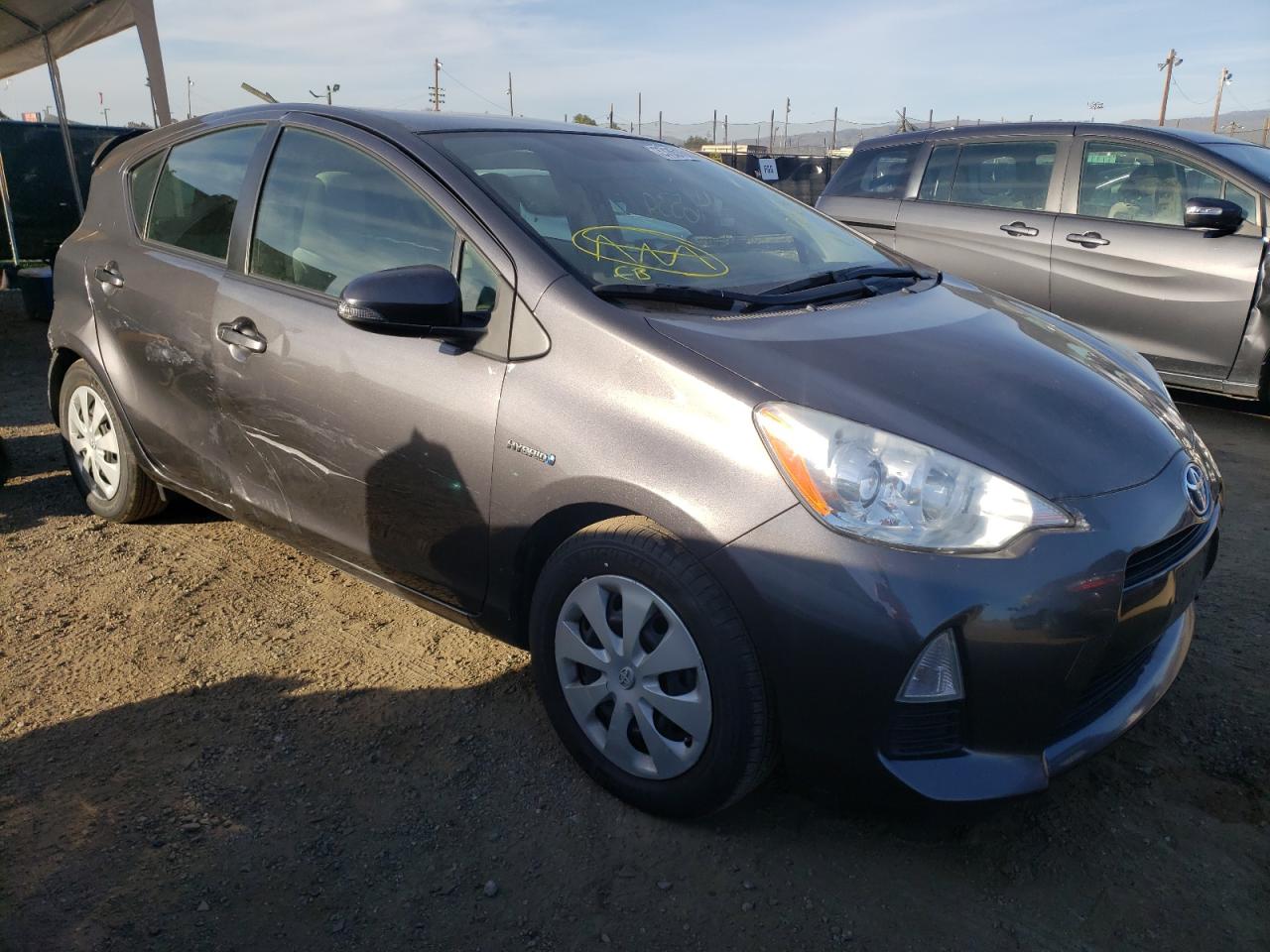 TOYOTA PRIUS C 2012 with VIN JTDKDTB35C1519579 - Photo from auction