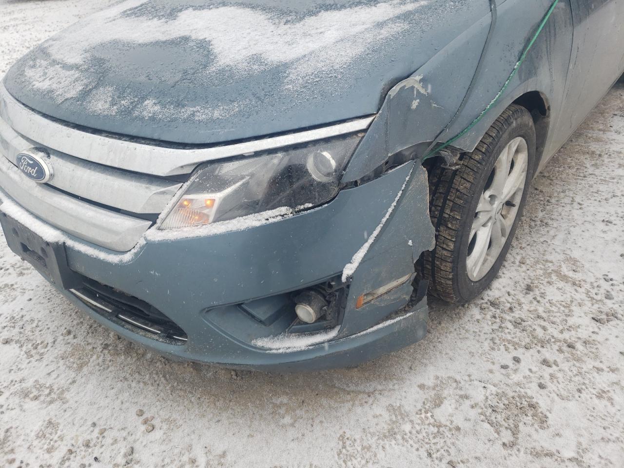 Photo 9 from auction – 2012 FORD FUSION SE with VIN 3FAHP0HA8CR106489