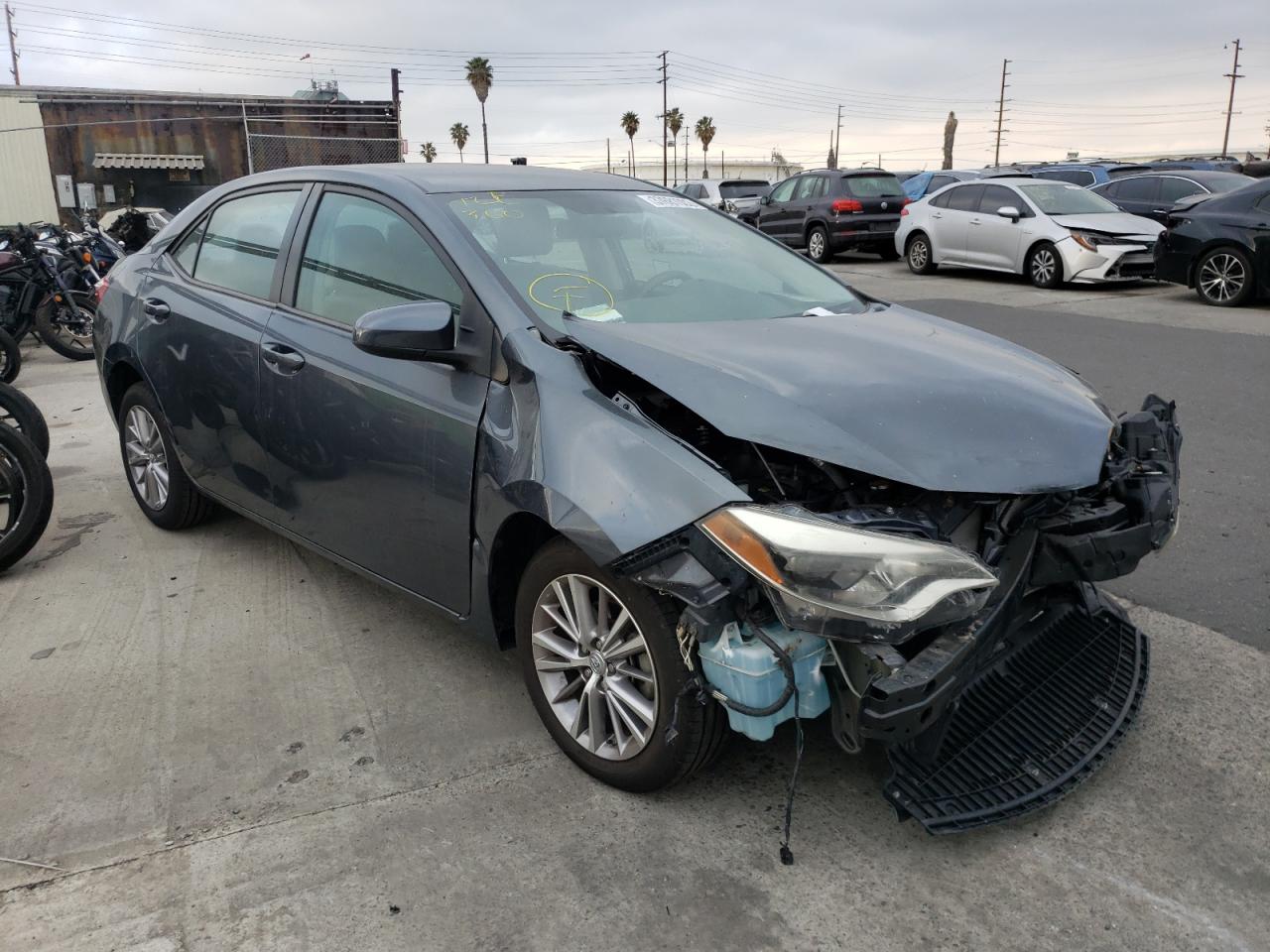 TOYOTA COROLLA L 2014 with VIN 5YFBURHE0EP010445 - Photo from auction
