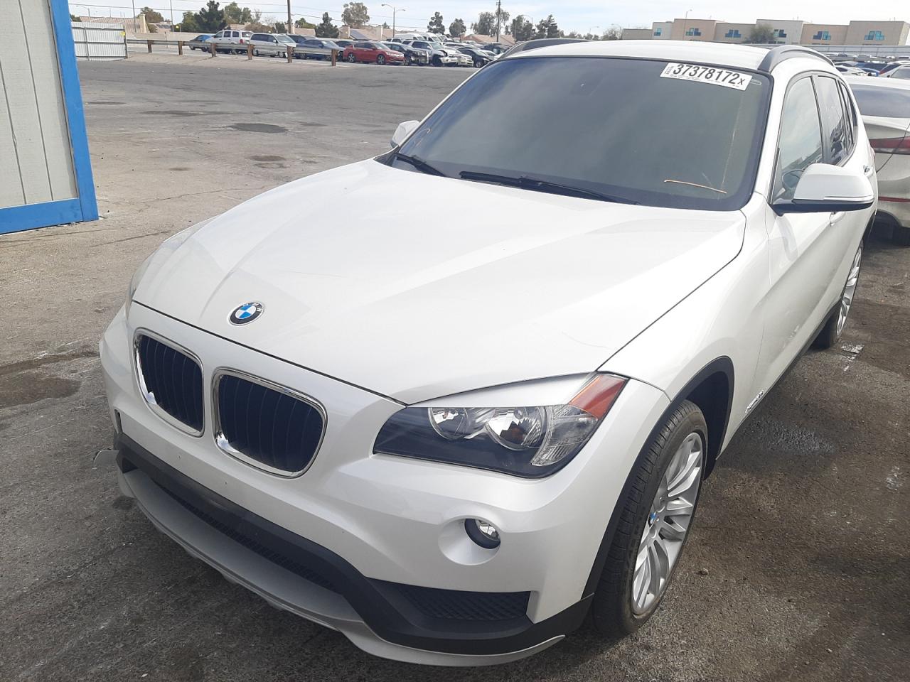 Photo 2 from auction – 2015 BMW X1 XDRIVE2 with VIN WBAVL1C57FVY36651
