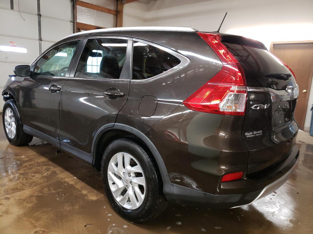 Photo 3 from auction – 2016 HONDA CR-V EXL with VIN 5J6RM4H76GL101941