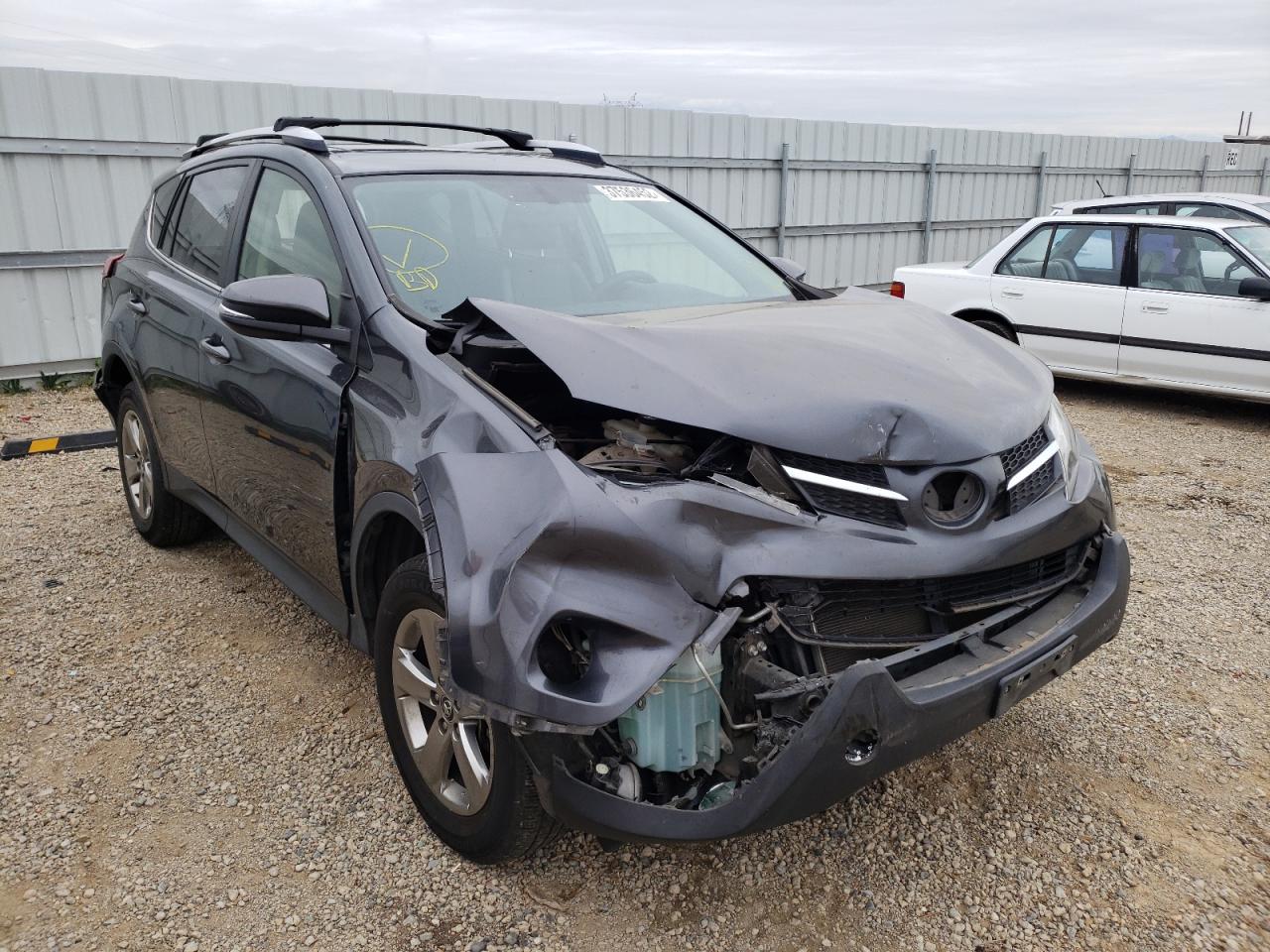 TOYOTA RAV4 XLE 2015 with VIN JTMWFREV7FD056651 - Photo from auction